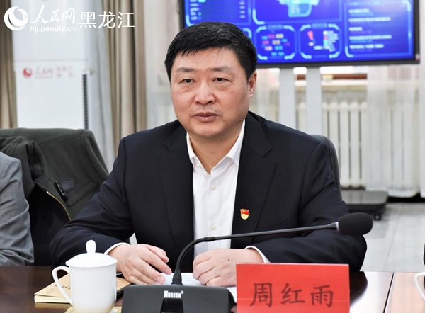 黑龍江銀保監局黨委委員、副局長周紅雨。人民網蘇靖剛攝